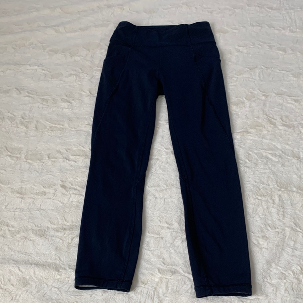 Lululemon high waist cropped pocket leggings. Navy size 4